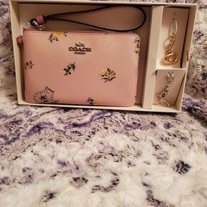 Coach wrislet with charms